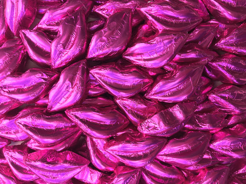 Kisses - Milk Chocolate Lips in Hot Pink foil 300g - Sunshine Confectionery